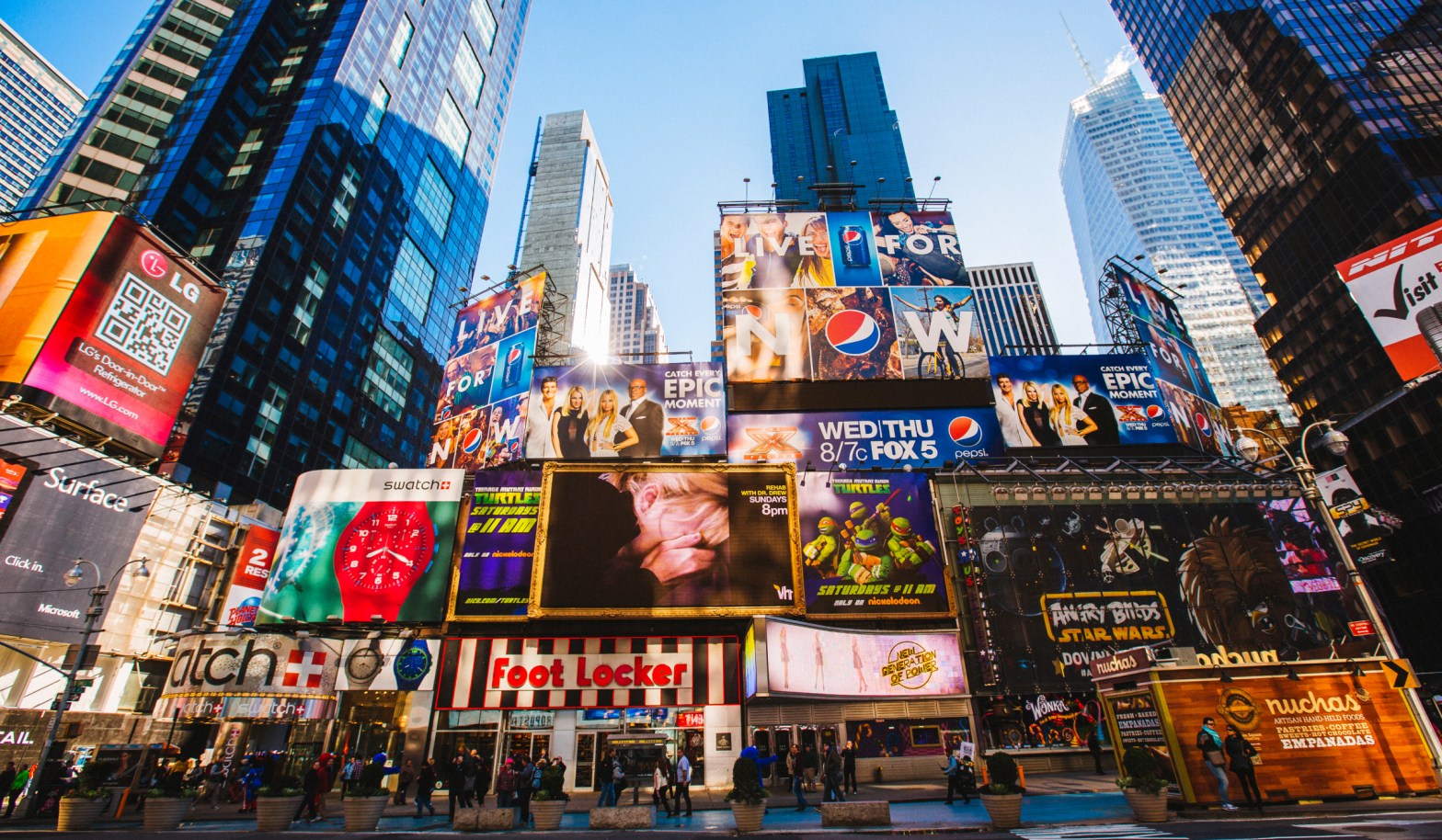 Marketing billboards in Times Square demonstrating the Marketing Rule