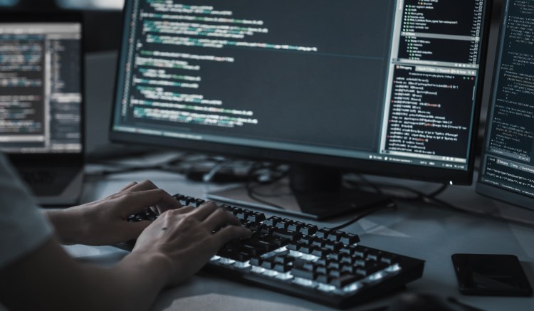 A security officer reviews encryption and security processes.