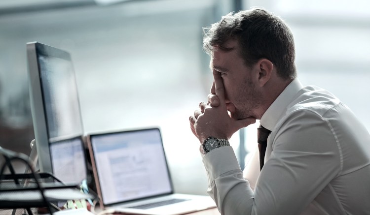 A compliance professional reviews his firm's AML compliance program.